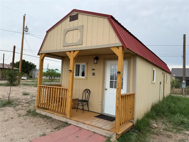 a front view of a house with a porch