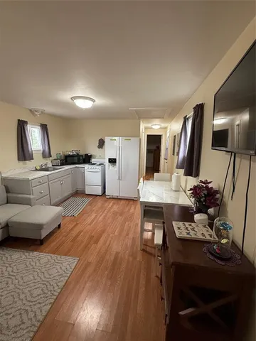 a view of a living room and dining room