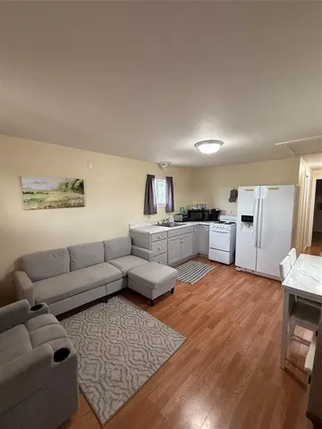 a living room with furniture and a couch