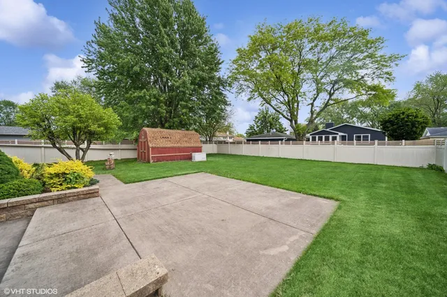 a view of a backyard with green space