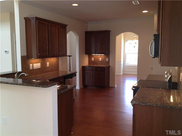 3 Hidden Ridge Court Durham, NC 27707 - Photo 5 of 20 Beautiful open kitchen with granite countertops, birch cabinets, hardwoods and upgraded appliances!