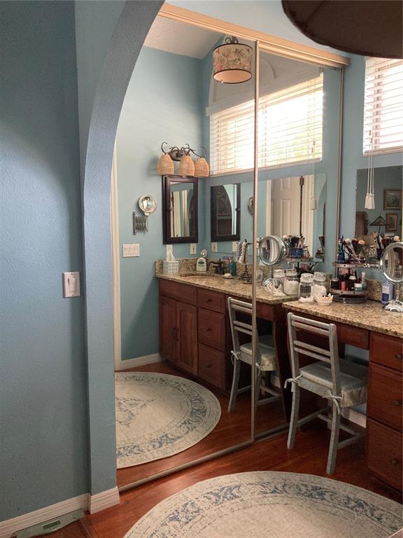8101 Roxboro Drive Hudson, FL 34667 - Photo 14 of 47 a room with stainless steel appliances kitchen island granite countertop a sink and a cabinets