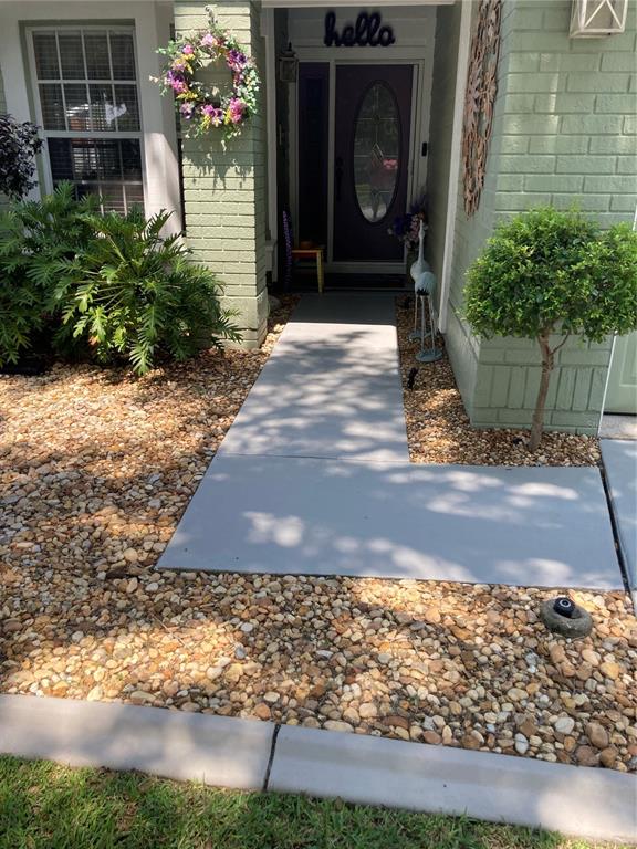 8101 Roxboro Drive Hudson, FL 34667 - Photo 3 of 47 a front view of a house