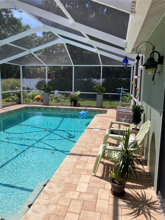 8101 Roxboro Drive Hudson, FL 34667 - Photo 37 of 47 a view of yard with patio