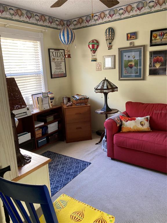 8101 Roxboro Drive Hudson, FL 34667 - Photo 46 of 47 a bedroom with furniture and a window