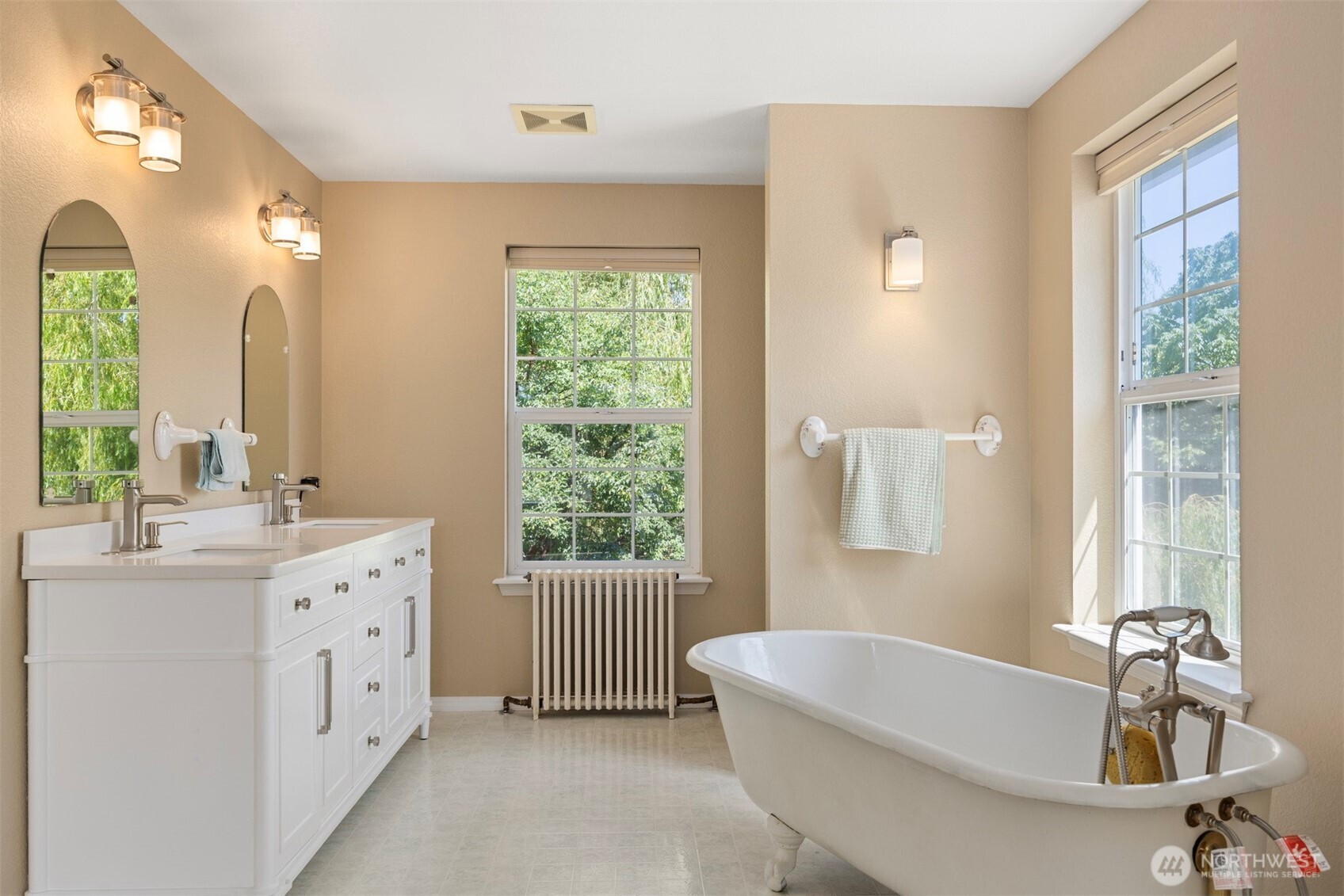 299 East Axton Road Bellingham, WA 98226 - Photo 33 of 40 a bathroom with a bathtub a sink a window and a shower