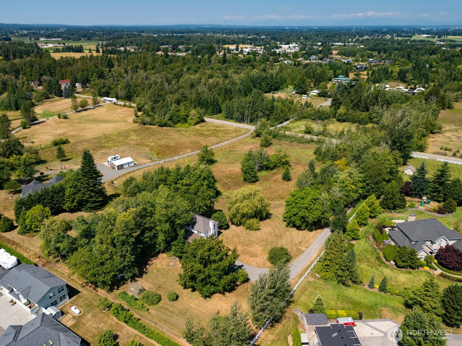 299 East Axton Road Bellingham, WA 98226 - Photo 4 of 40 an aerial view of a house with a yard