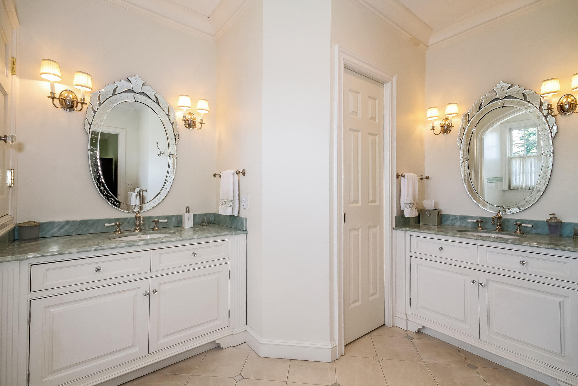 17 Searles Road Darien, CT 06820 - Photo 19 of 36 a bathroom with a granite countertop double vanity sink and a mirror