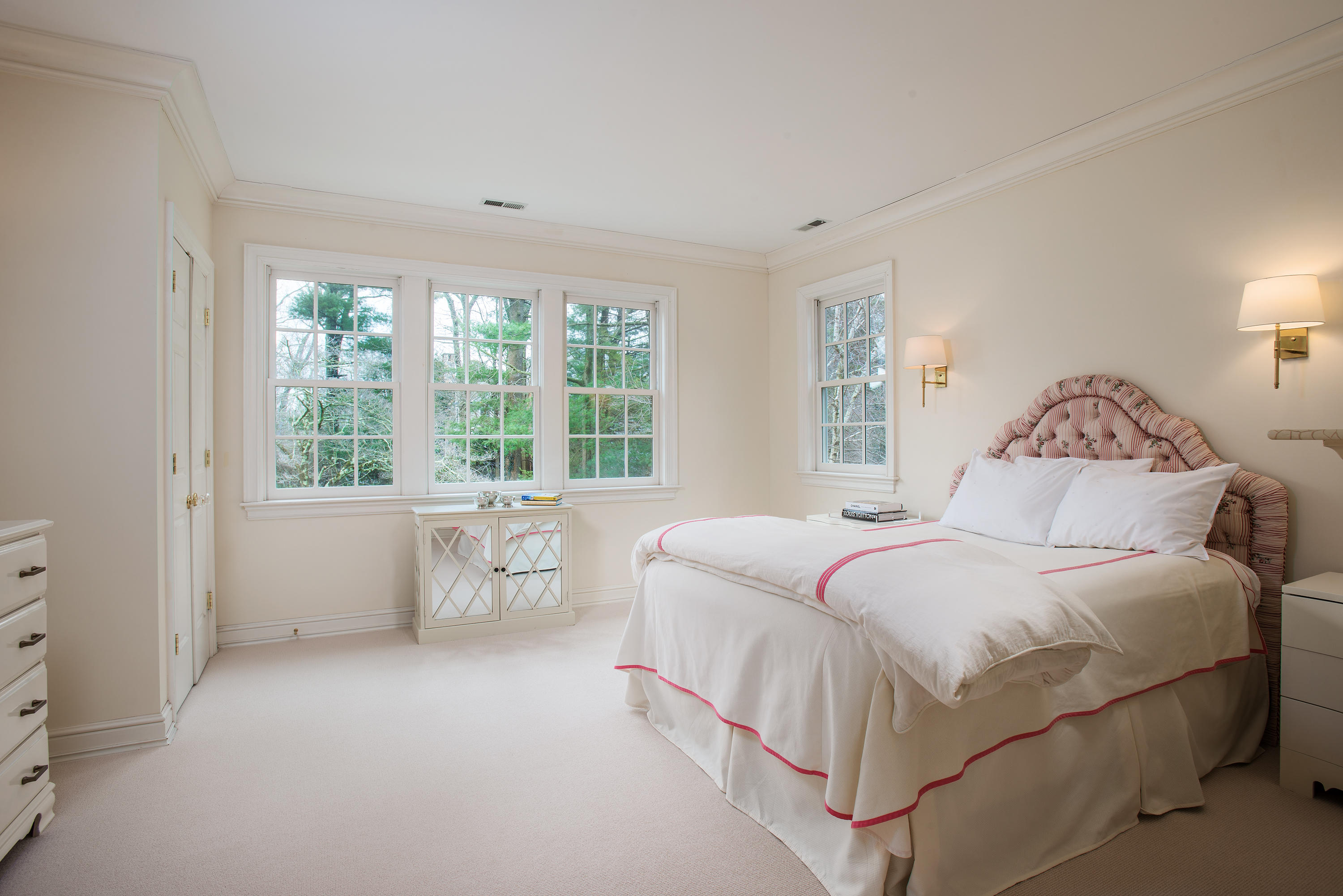 17 Searles Road Darien, CT 06820 - Photo 20 of 36 a bedroom with a large bed and a large window