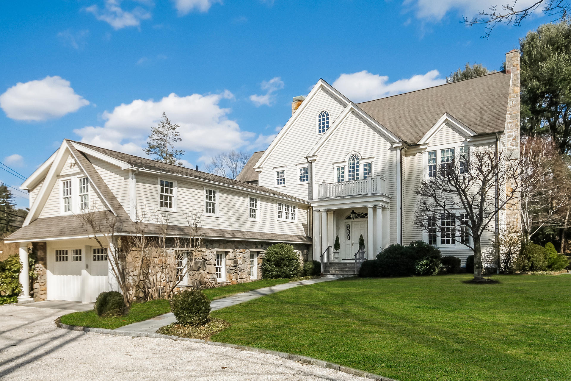 17 Searles Road Darien, CT 06820 - Photo 2 of 36 a front view of a house with a garden