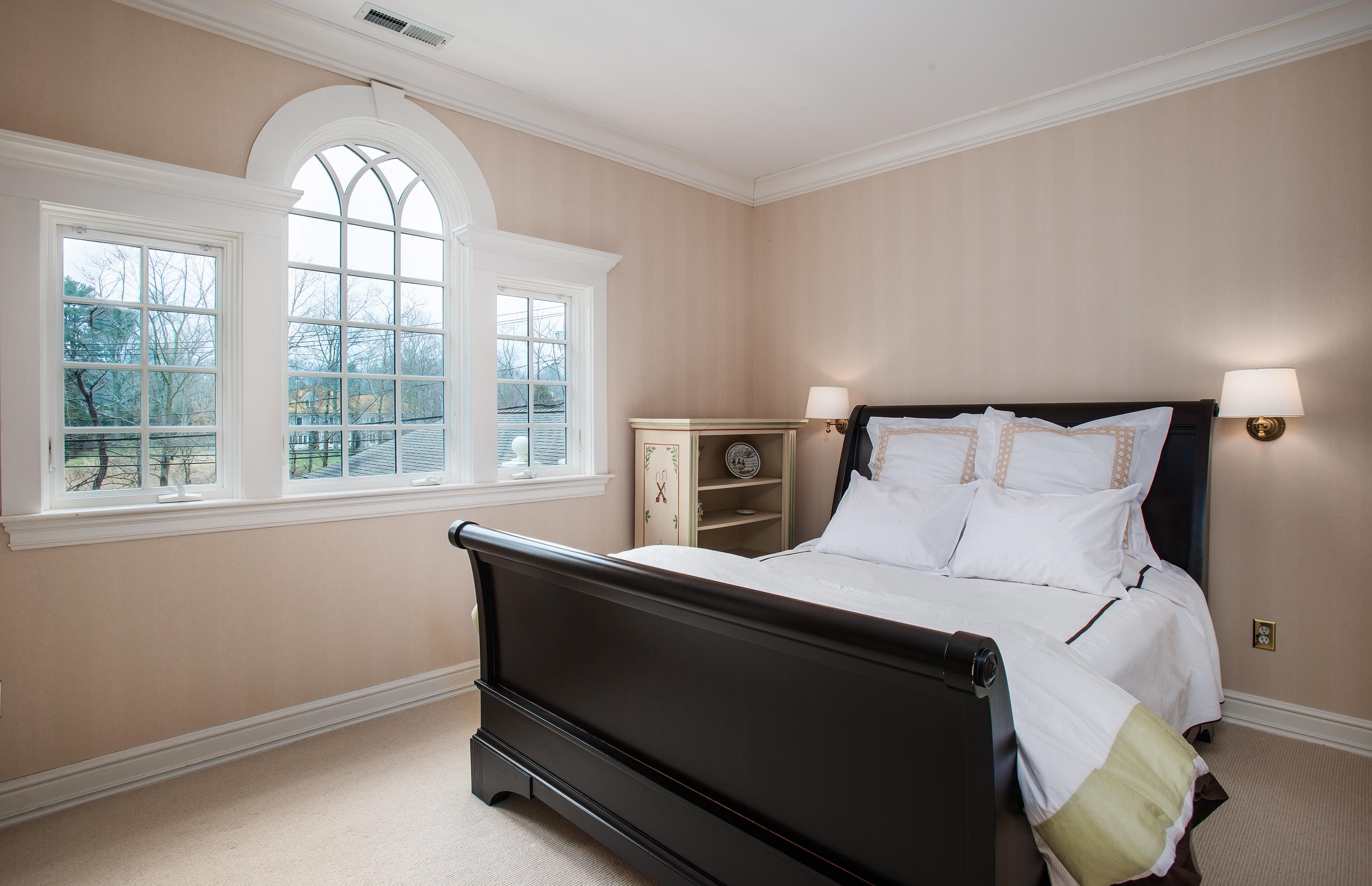 17 Searles Road Darien, CT 06820 - Photo 25 of 36 a bedroom with a bed and a large window