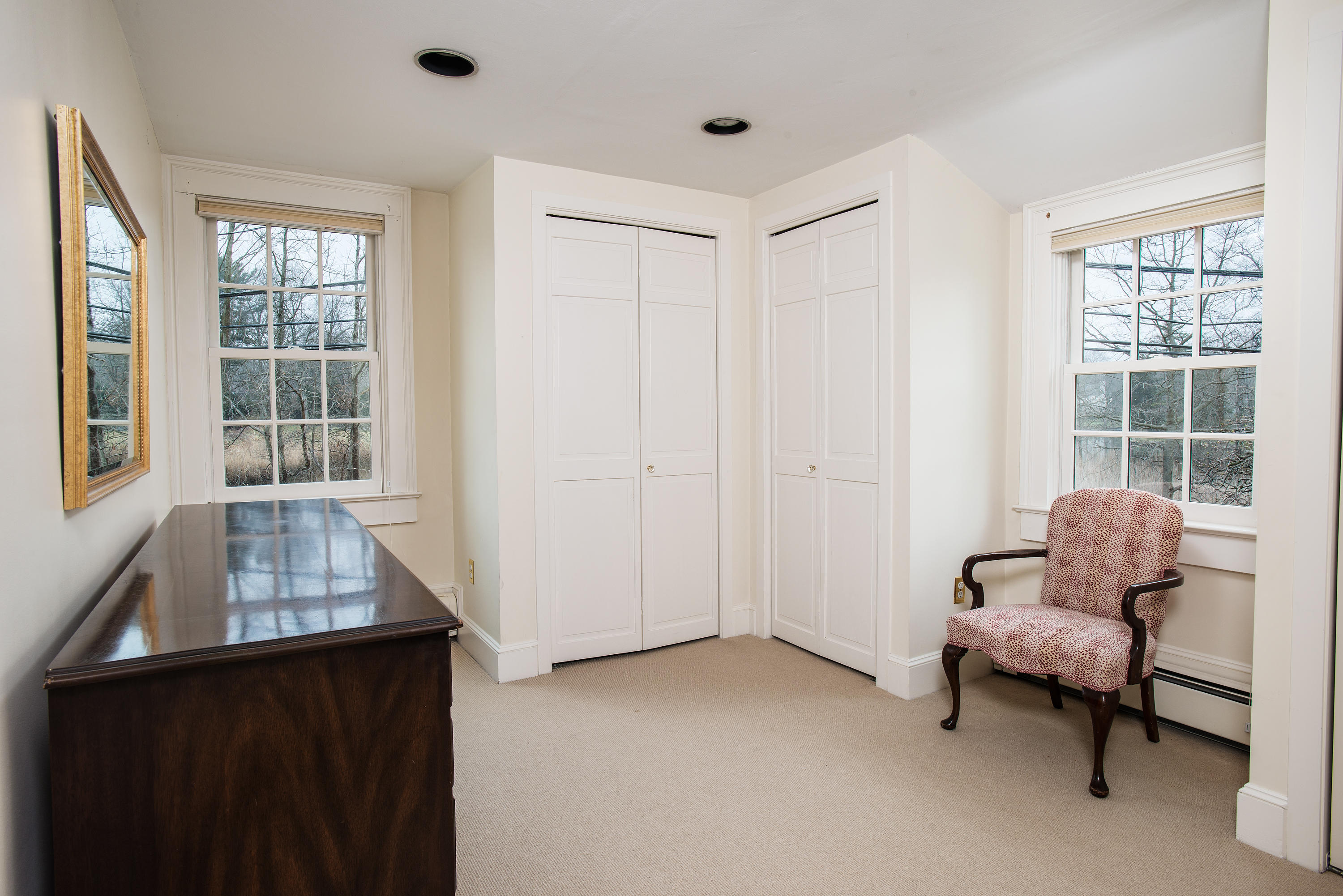 17 Searles Road Darien, CT 06820 - Photo 27 of 36 a living room with furniture and a window