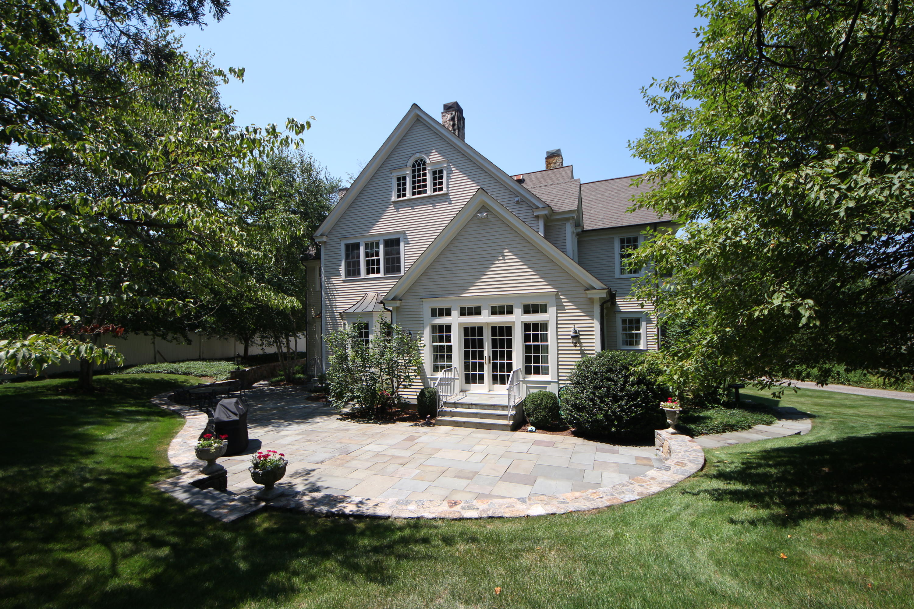17 Searles Road Darien, CT 06820 - Photo 29 of 36 a front view of a house with a yard