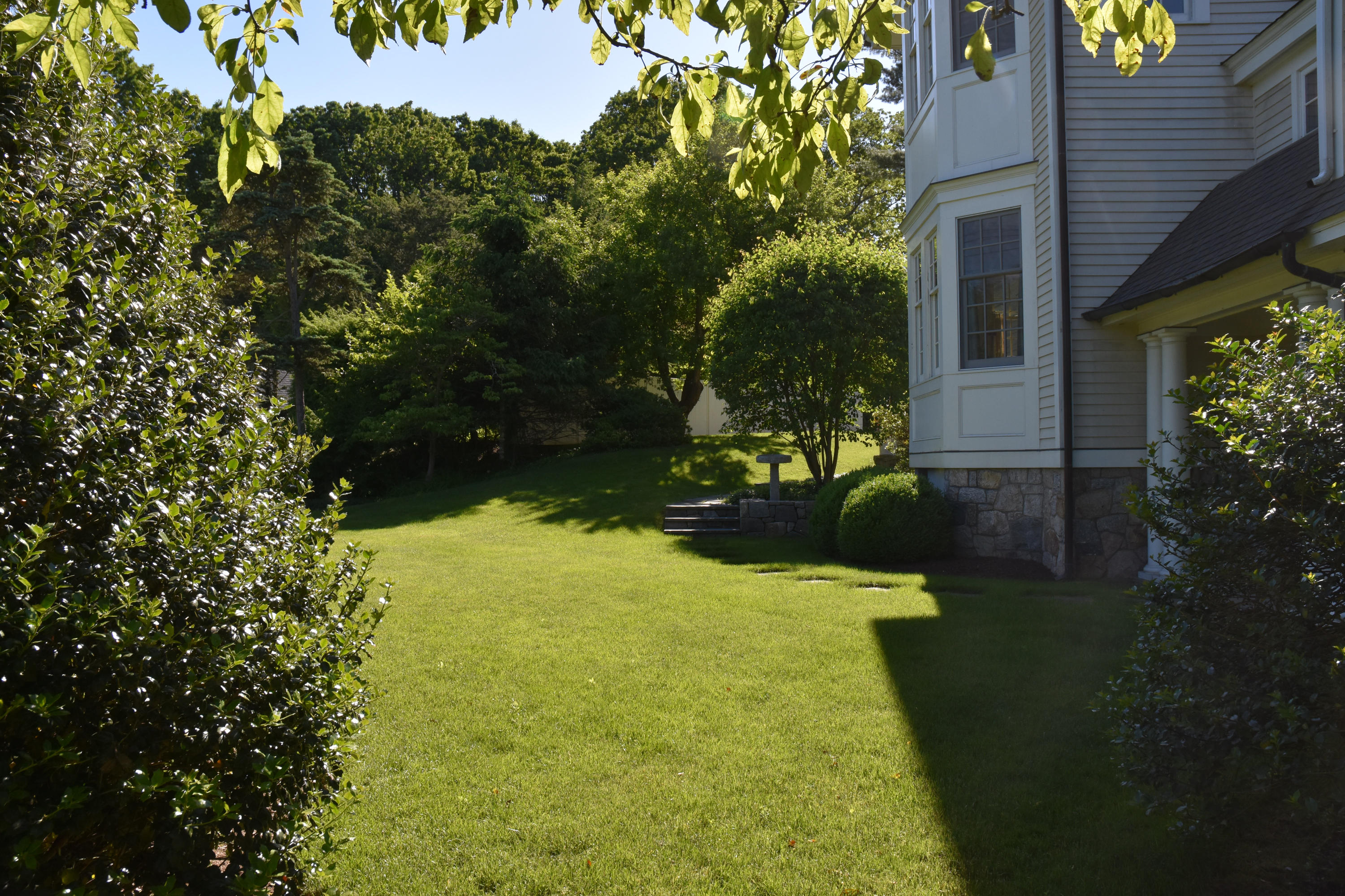 17 Searles Road Darien, CT 06820 - Photo 32 of 36 a view of swimming pool from a garden