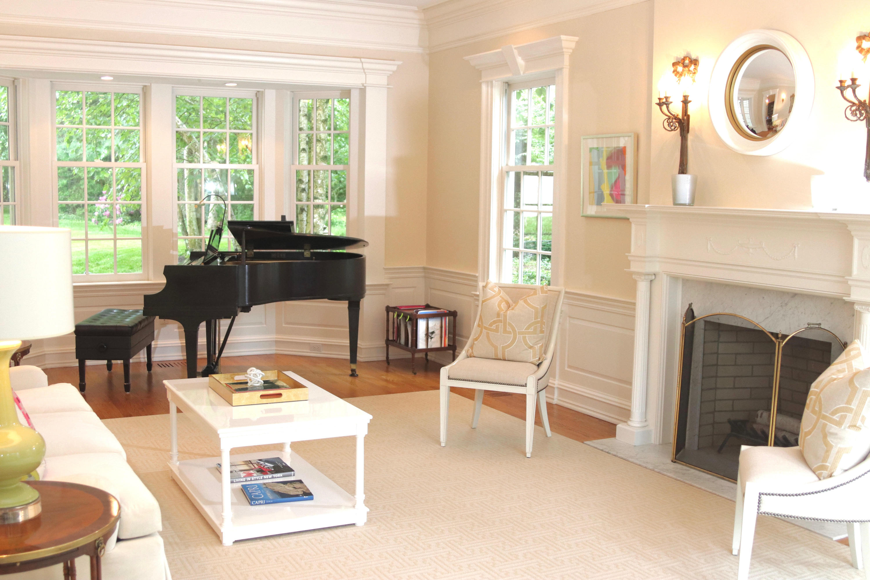 17 Searles Road Darien, CT 06820 - Photo 4 of 36 a living room with furniture a fireplace and a large window