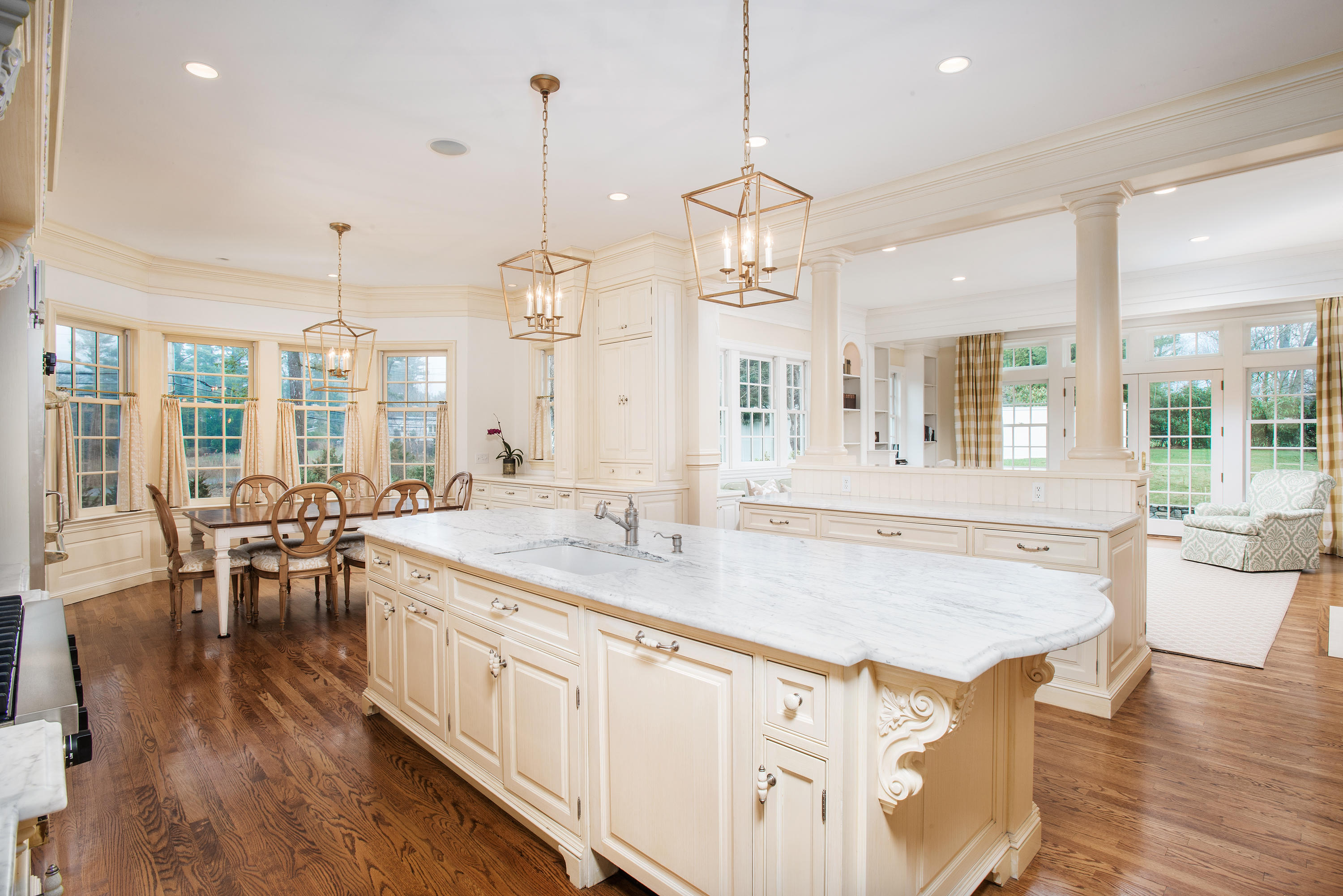 17 Searles Road Darien, CT 06820 - Photo 10 of 36 a large kitchen with kitchen island a large island in it