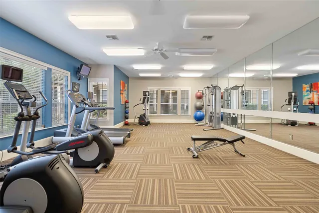 a view of a room with gym equipment