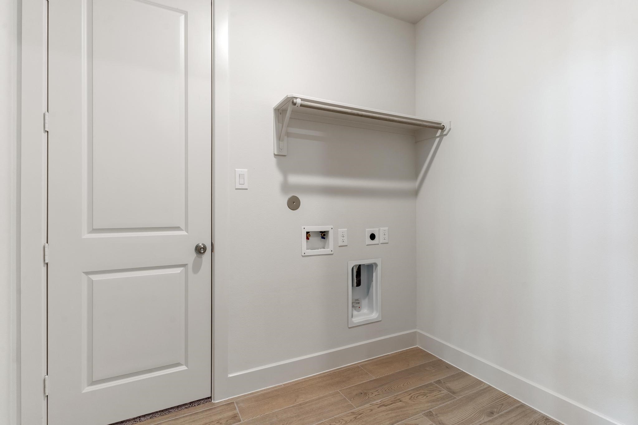 407 Mathis Lk Court Conroe, TX 77304 - Photo 11 of 26 Laundry Room