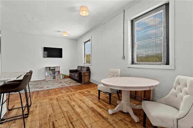 a view of a dining room with furniture