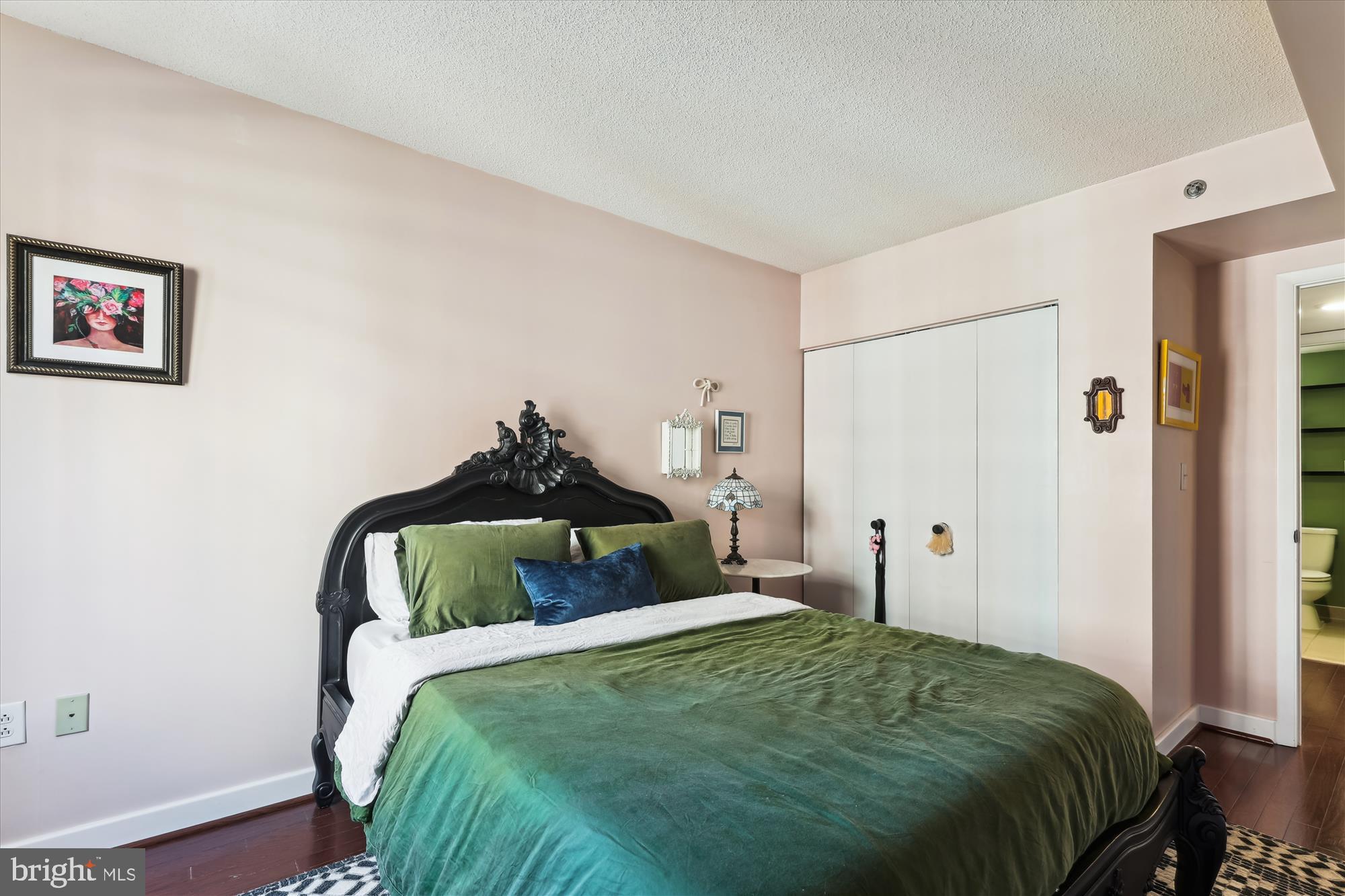 1150 K Street Northwest, Unit 706 Washington, DC 20005 - Photo 16 of 34 a bedroom with a bed and a window