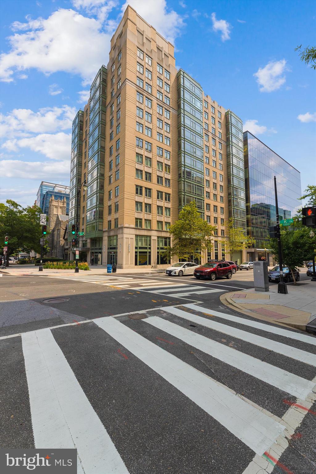 1150 K Street Northwest, Unit 706 Washington, DC 20005 - Photo 21 of 34 a view of a city street lined with buildings and trees
