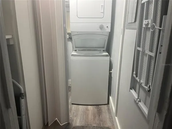 a bathroom with a sink a toilet and a shower