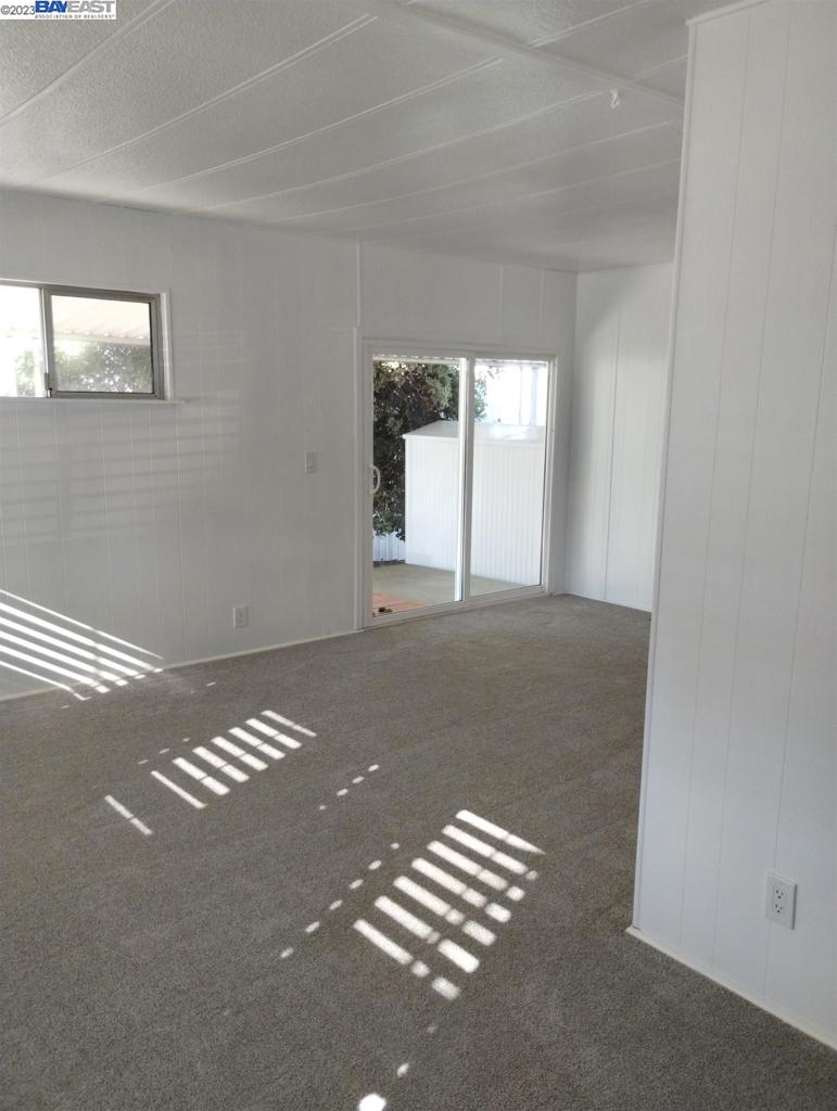 2073 Dalis Drive Concord, CA 94520 - Photo 11 of 15 a view of an empty room with a window