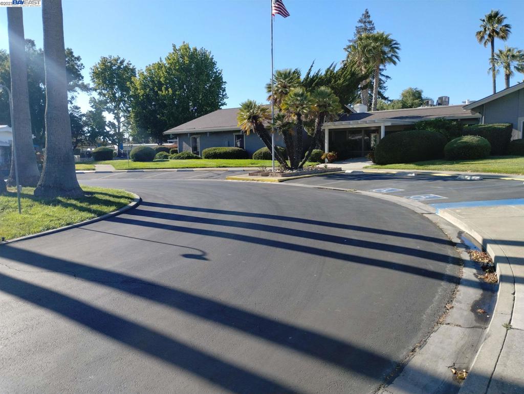 2073 Dalis Drive Concord, CA 94520 - Photo 13 of 15 a view of swimming pool with a bench and trees around