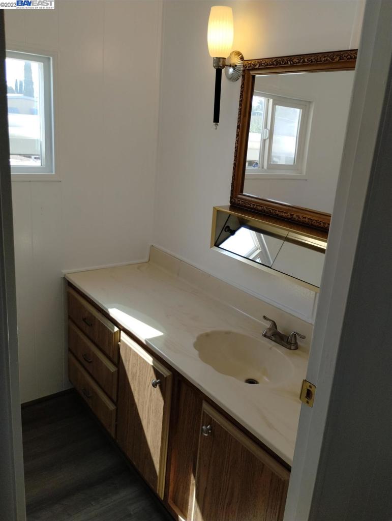 2073 Dalis Drive Concord, CA 94520 - Photo 6 of 15 a bathroom with a sink and a mirror