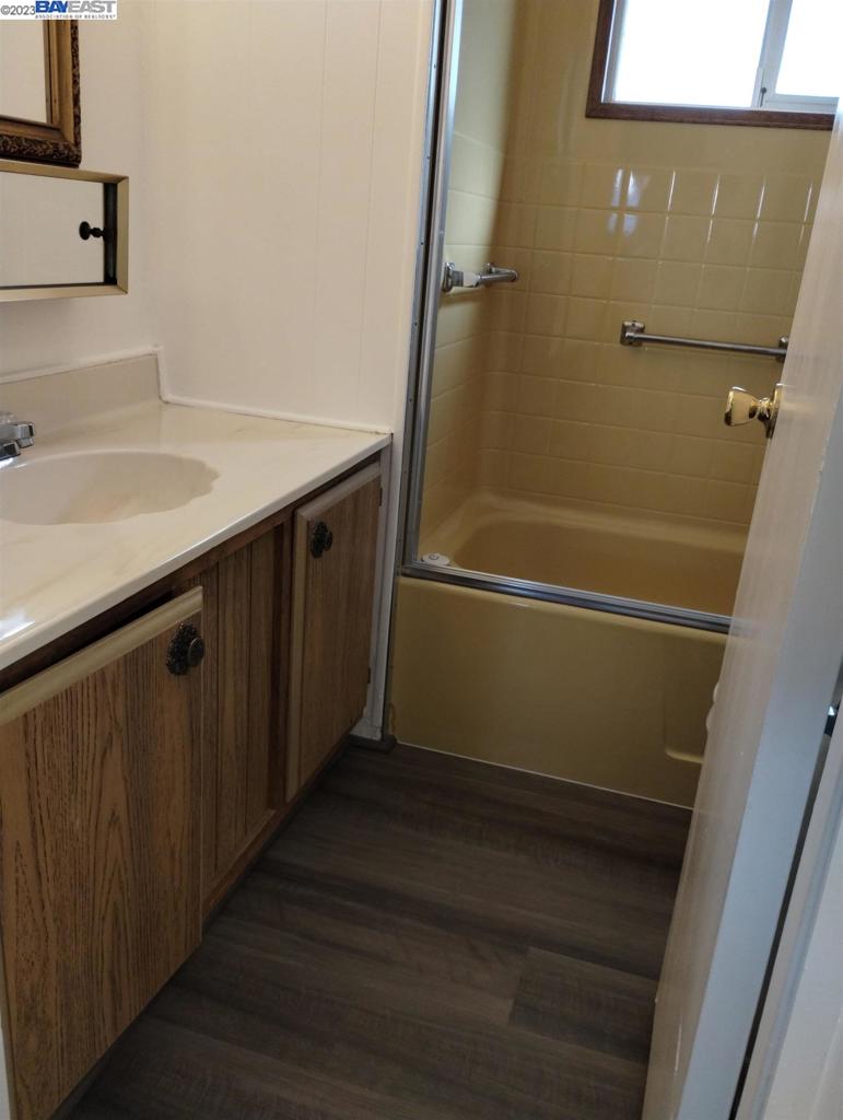 2073 Dalis Drive Concord, CA 94520 - Photo 10 of 15 a bathroom with a sink and a mirror