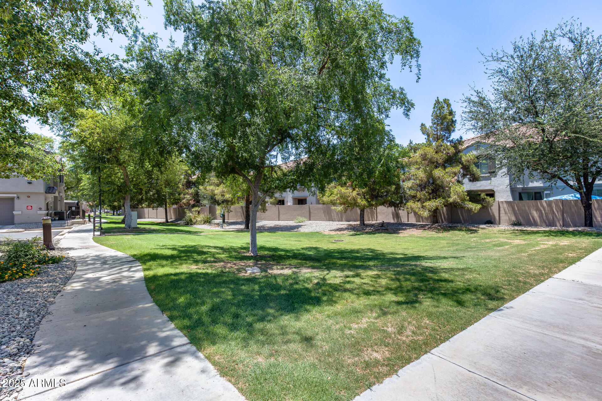 2941 East Darrow Street Phoenix, AZ 85042 - Photo 40 of 48 a huge green field with lots of trees