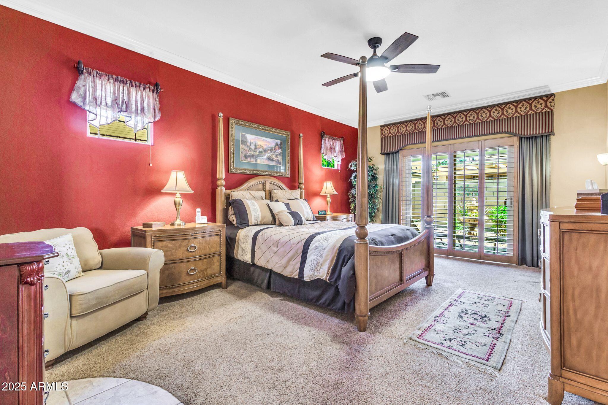 6959 South Rincon Drive Chandler, AZ 85249 - Photo 20 of 38 a bedroom with a bed couches and large windows