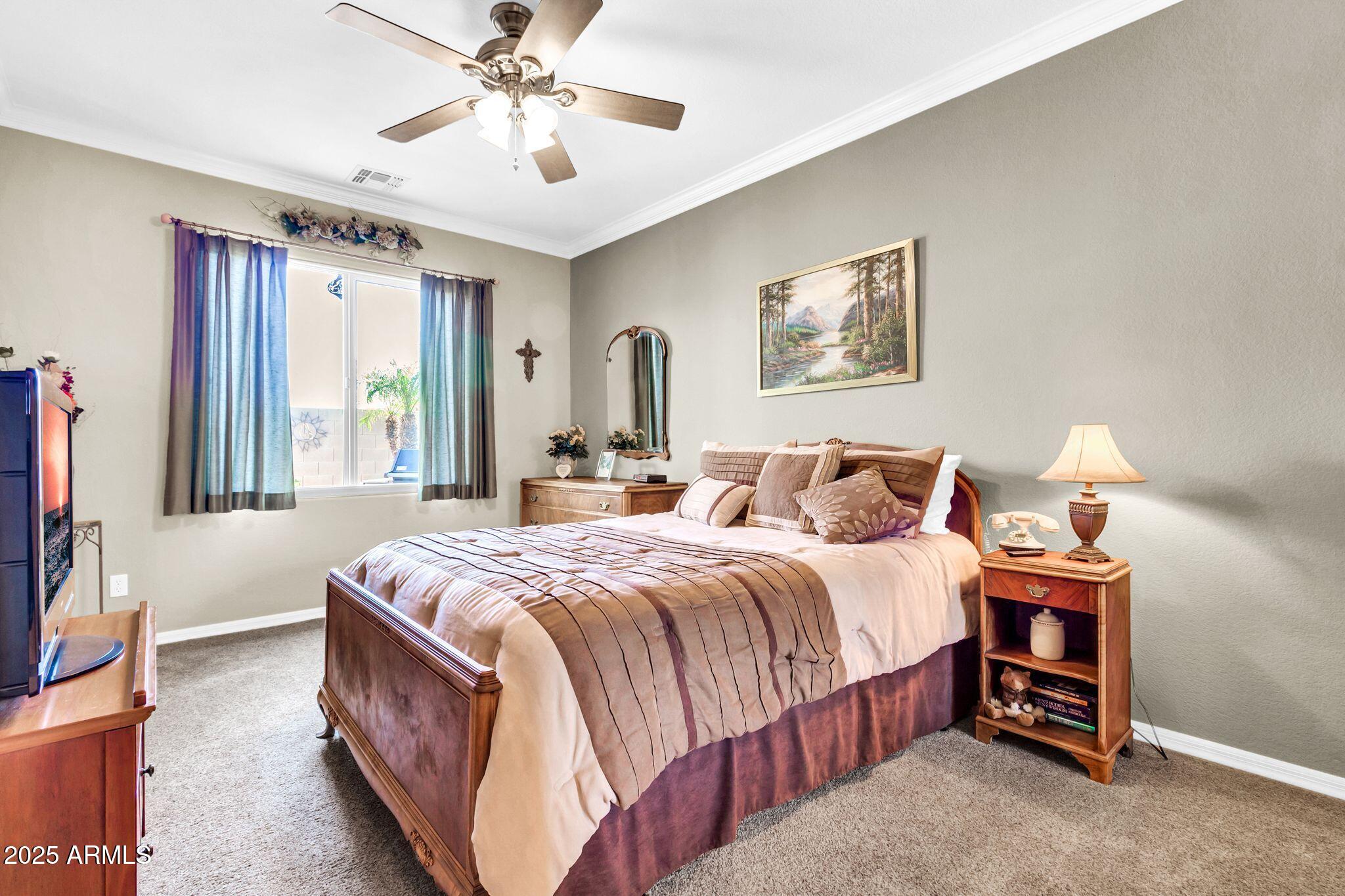 6959 South Rincon Drive Chandler, AZ 85249 - Photo 25 of 38 a bedroom with bed and window