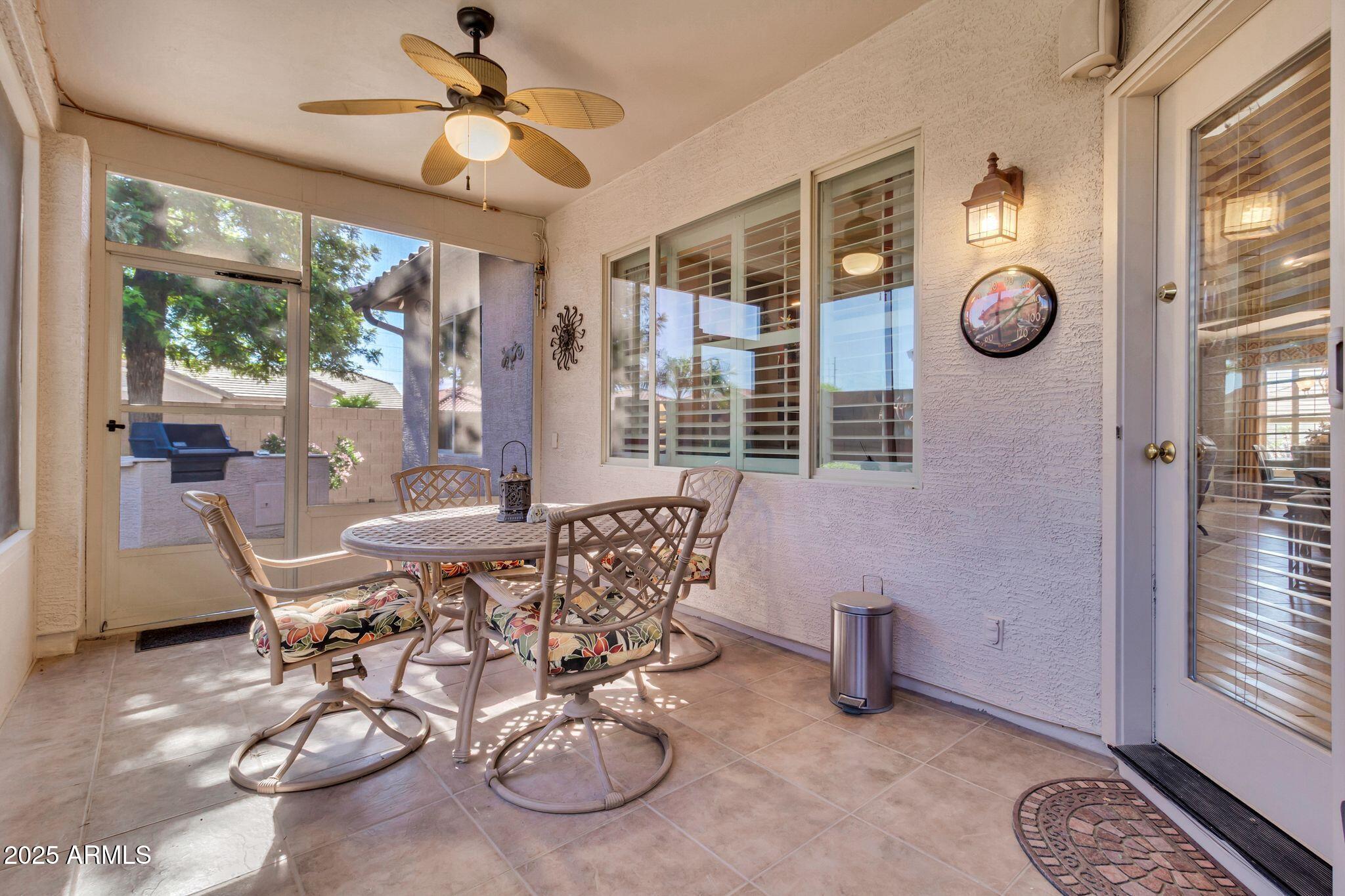 6959 South Rincon Drive Chandler, AZ 85249 - Photo 32 of 38 a view of a livingroom with furniture window and outside view