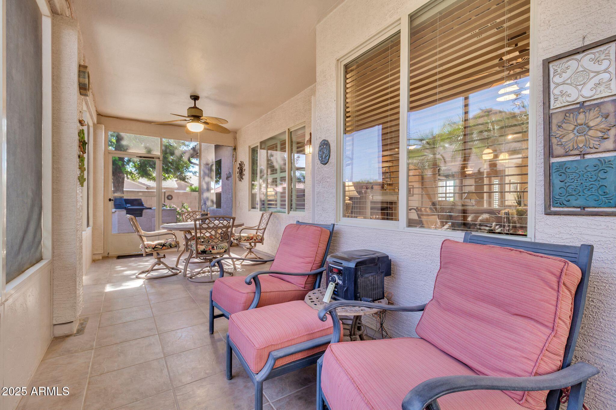 6959 South Rincon Drive Chandler, AZ 85249 - Photo 33 of 38 a living room with furniture and a large window