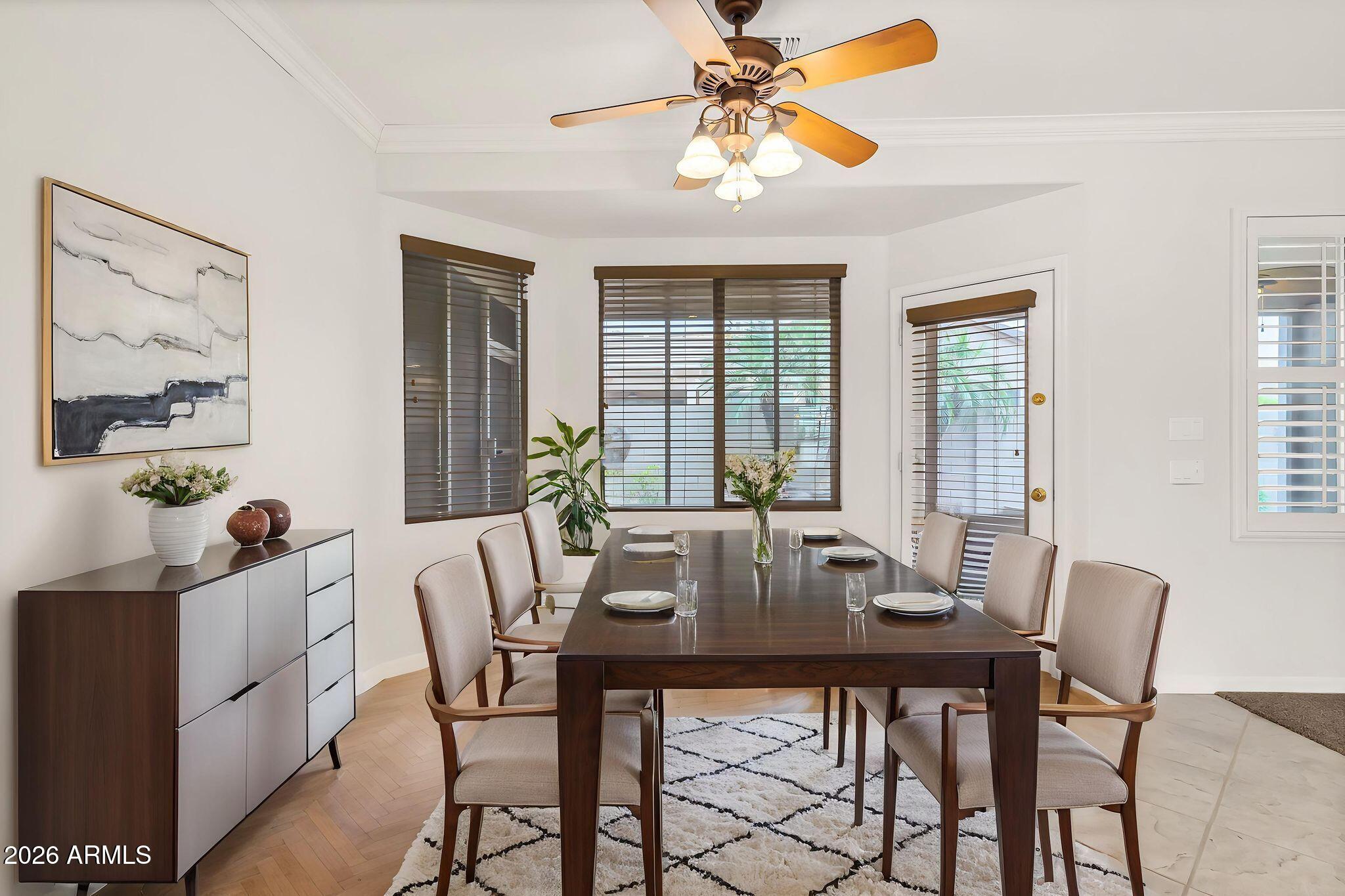 6959 South Rincon Drive Chandler, AZ 85249 - Photo 4 of 25 a view of a dining room with furniture window and outside view