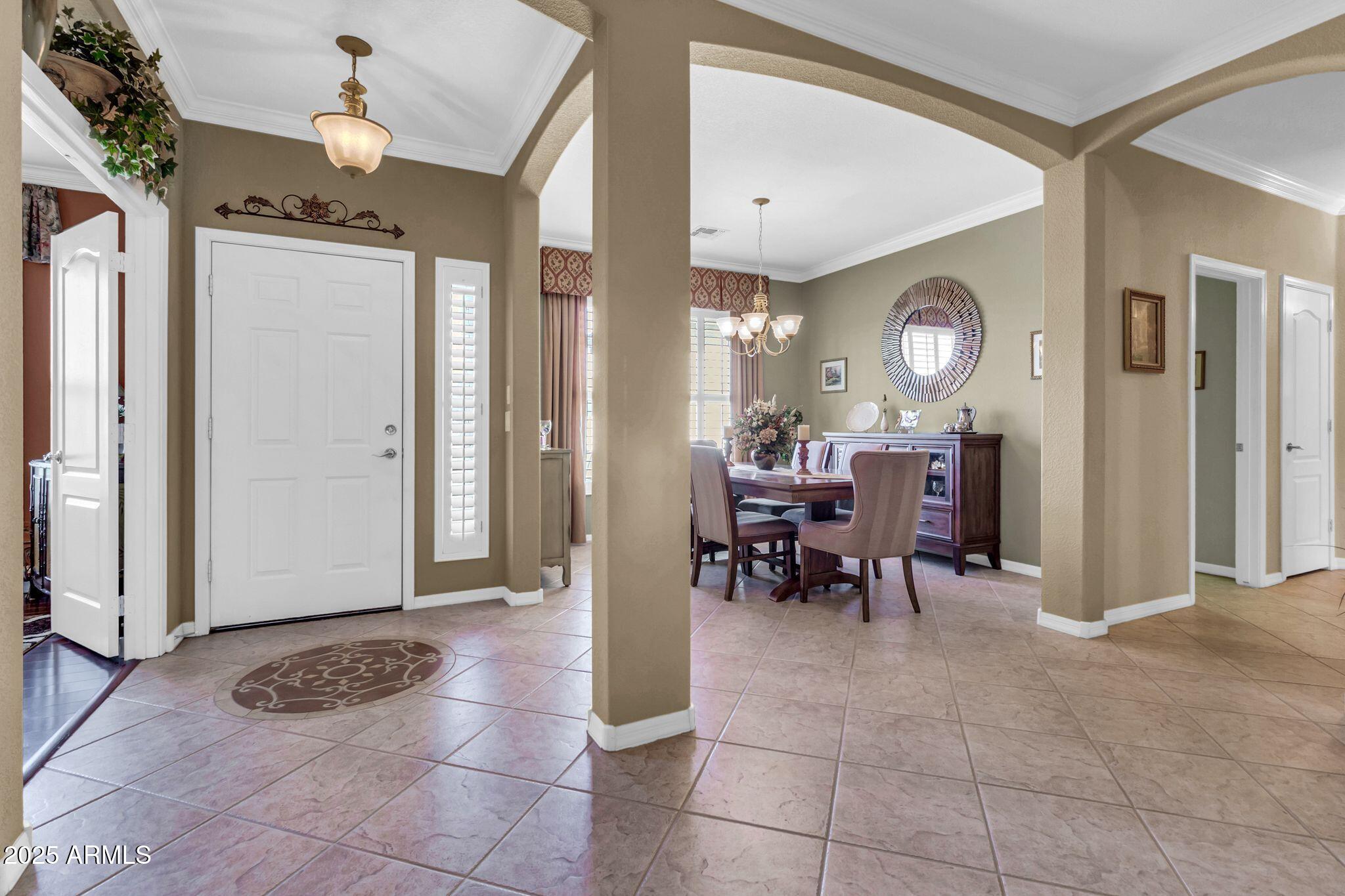 6959 South Rincon Drive Chandler, AZ 85249 - Photo 7 of 38 a view of a livingroom with furniture and a window