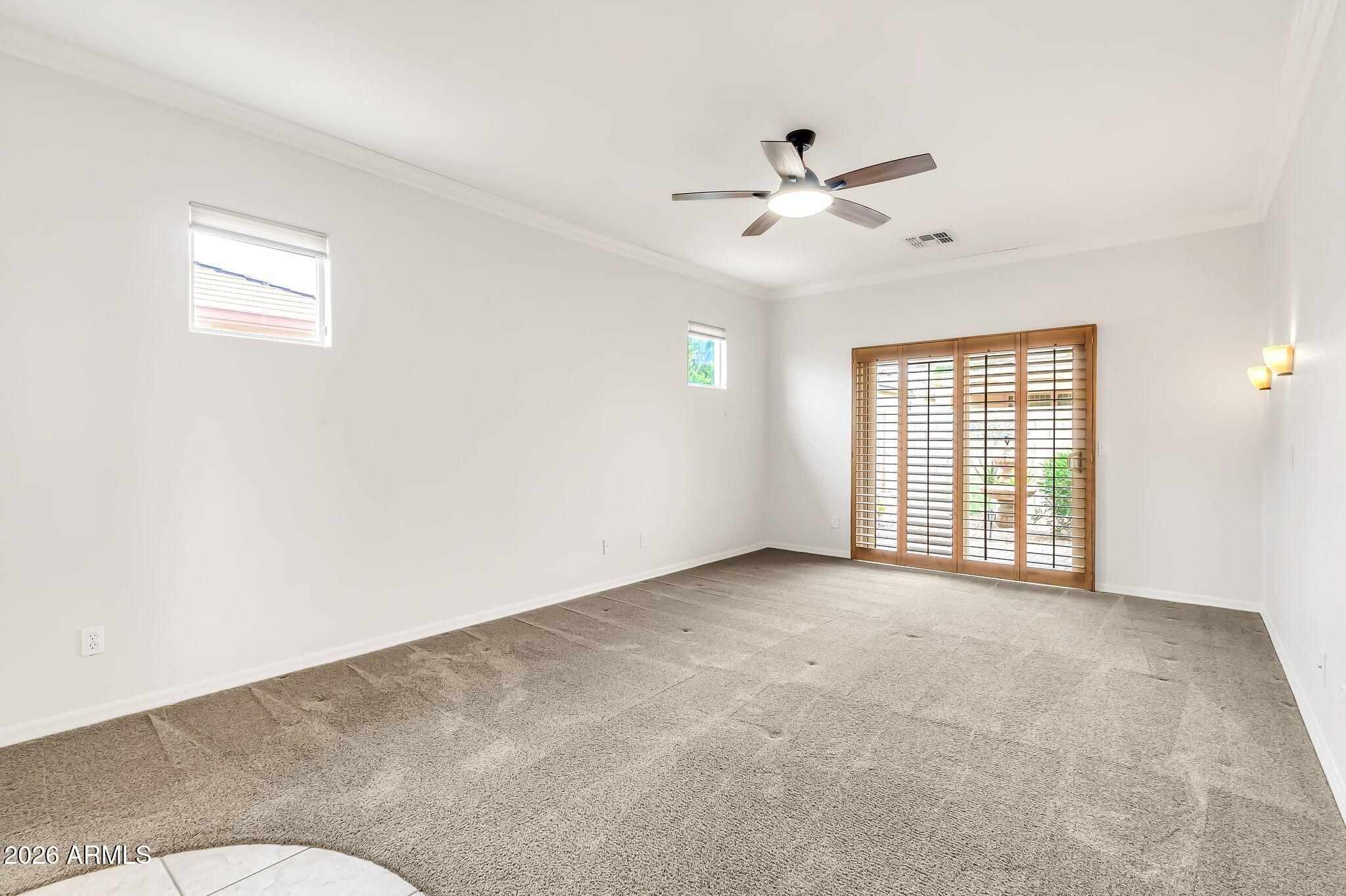 6959 South Rincon Drive Chandler, AZ 85249 - Photo 8 of 25 a view of an empty room with a window
