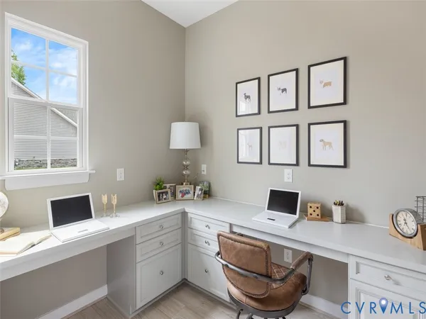 a workstation with a sink and a window