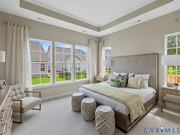 a bed room with a bed and a couch