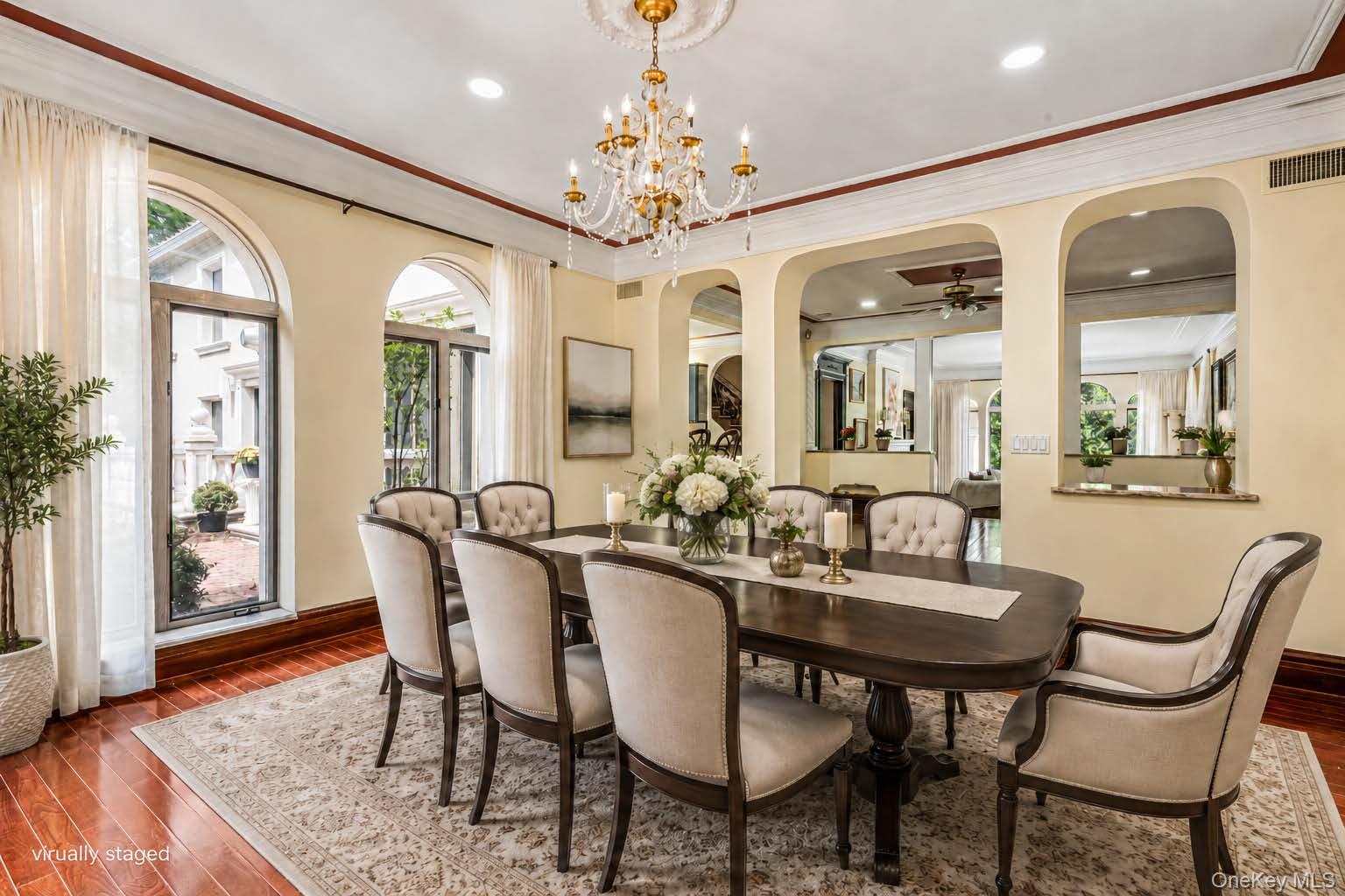 952 Cedar Swamp Road Glen Head, NY 11545 - Photo 13 of 47 a view of a dining room with furniture and wooden floor