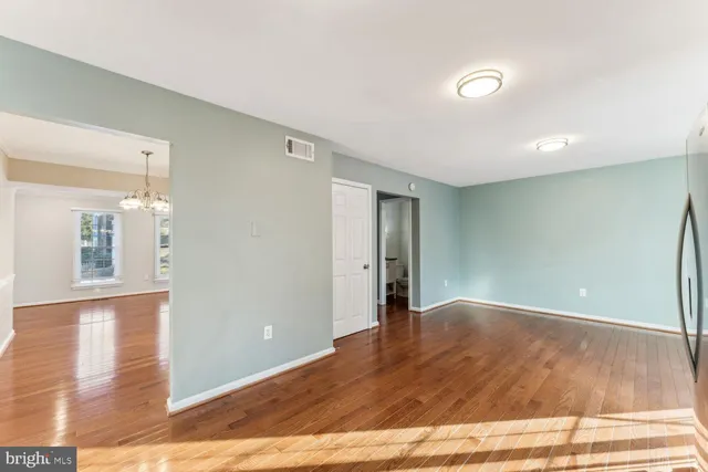 a view of a livingroom with wooden floor
