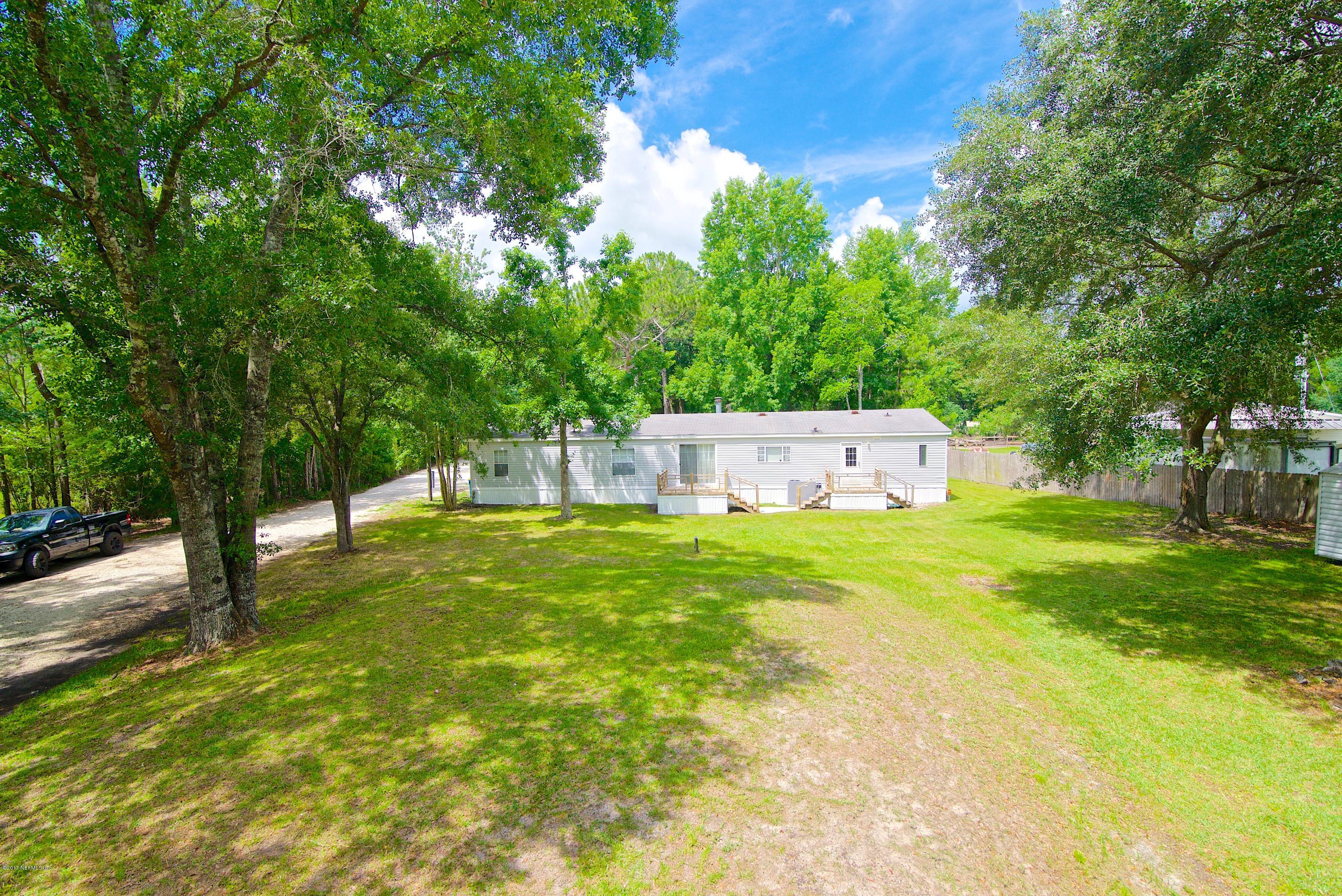 15923 Lem Turner Road Jacksonville, FL 32218 - Photo 22 of 27 Back of Home 2