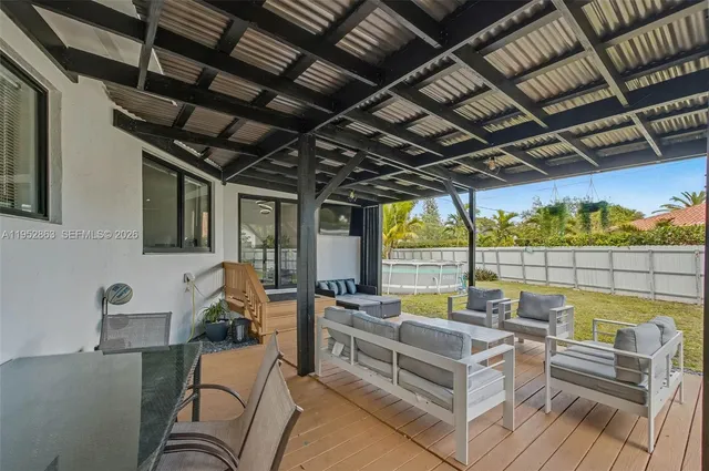 a view of living room and deck