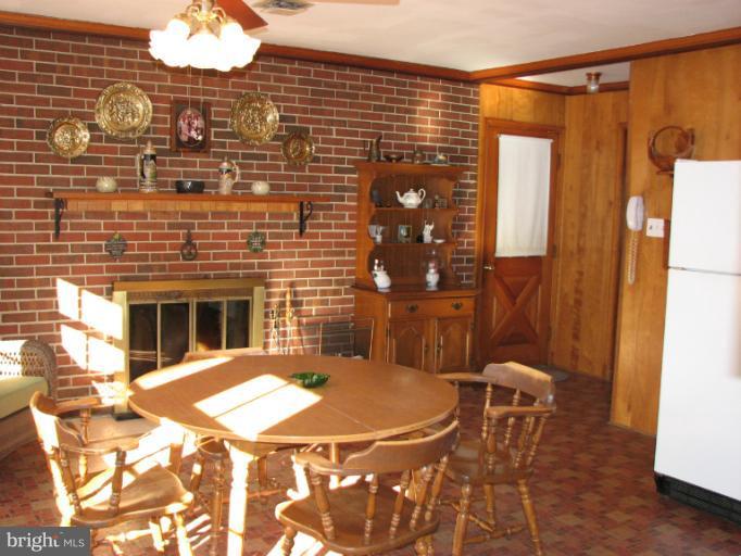 14709 Harold Road Silver Spring, MD 20905 - Photo 12 of 12 Kitchen with brick fireplace