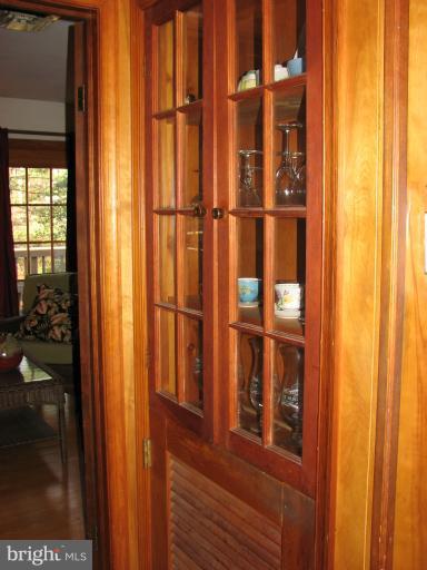 14709 Harold Road Silver Spring, MD 20905 - Photo 10 of 12 built in cabinet with glass doors