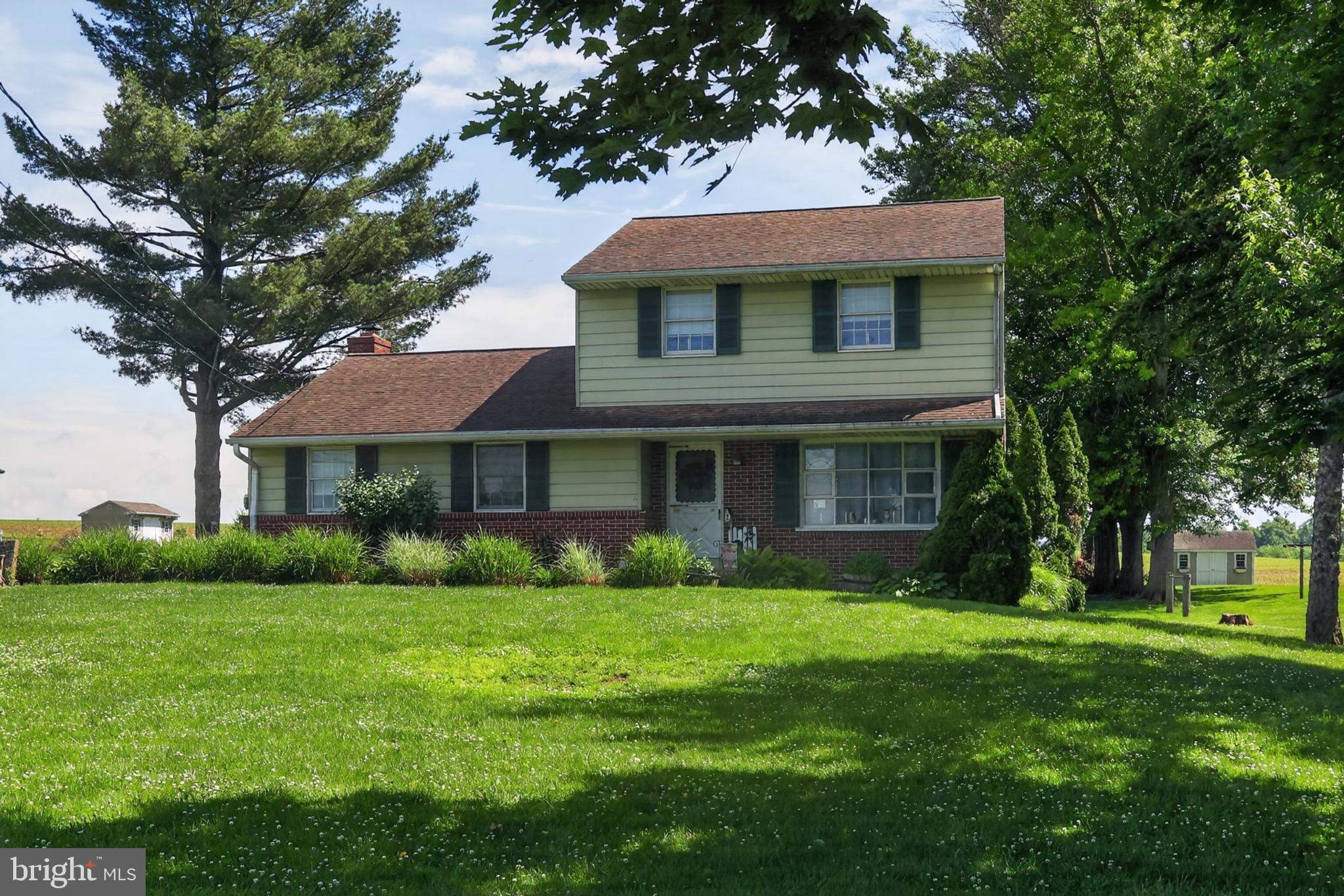 1106 Village Road Lancaster, PA 17602 - Photo 13 of 42 Charming home nestled in lush greenery.