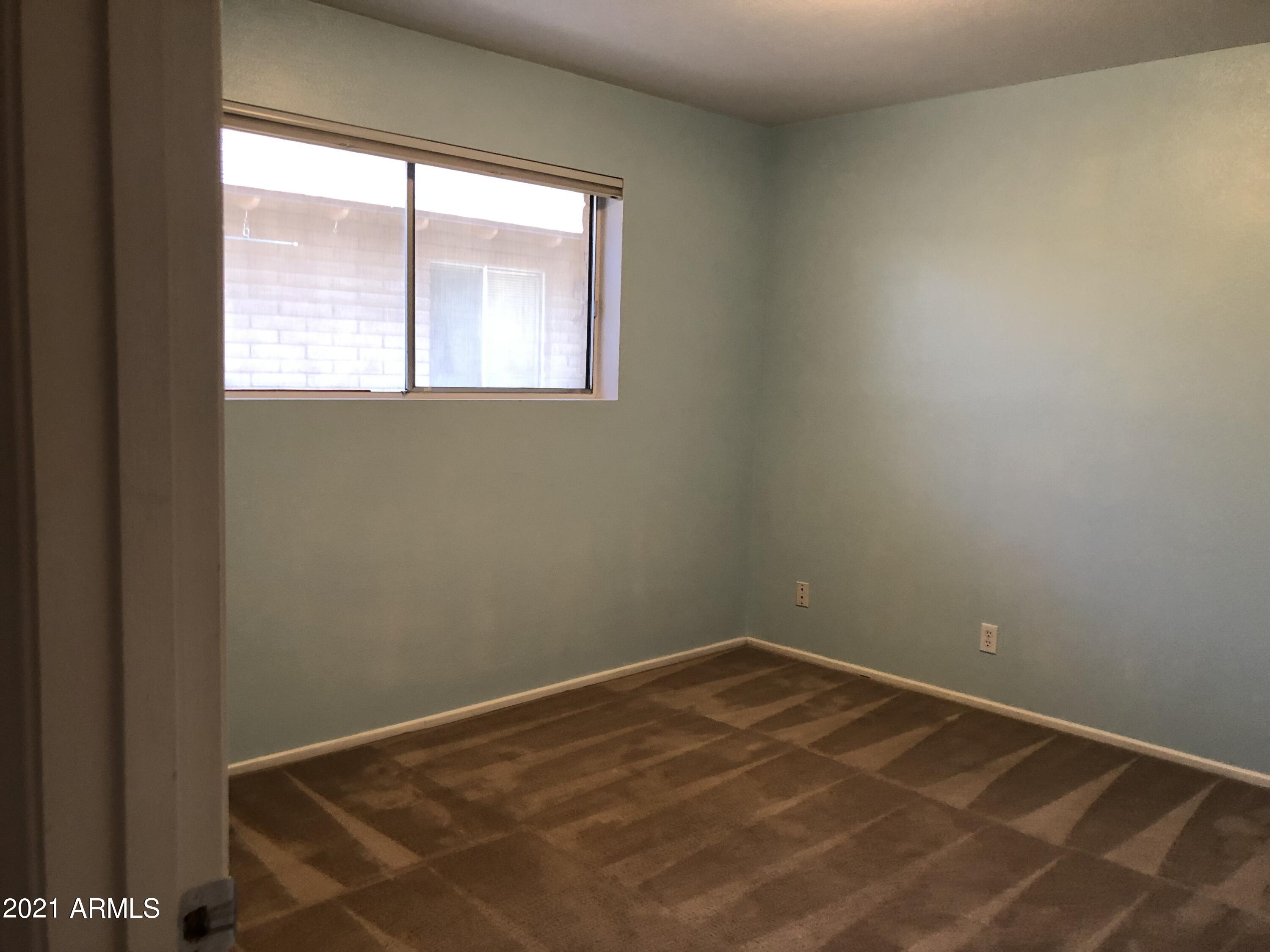 3031 South Rural Road, Unit 41 Tempe, AZ 85282 - Photo 14 of 23 a view of a room with a window
