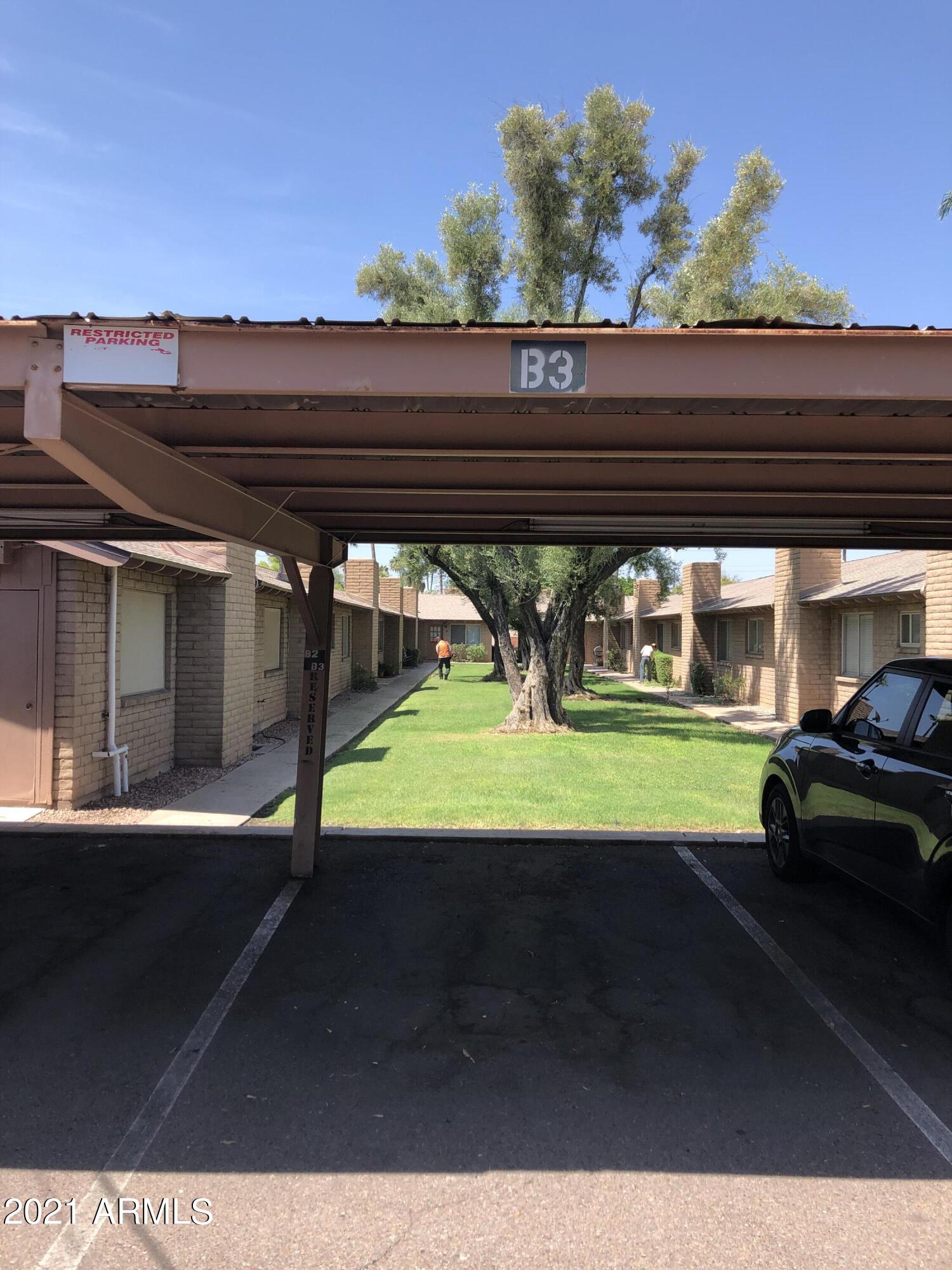 3031 South Rural Road, Unit 41 Tempe, AZ 85282 - Photo 22 of 23 a view of yard with car parked