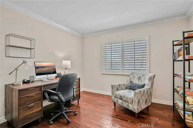 a workspace with furniture and a window